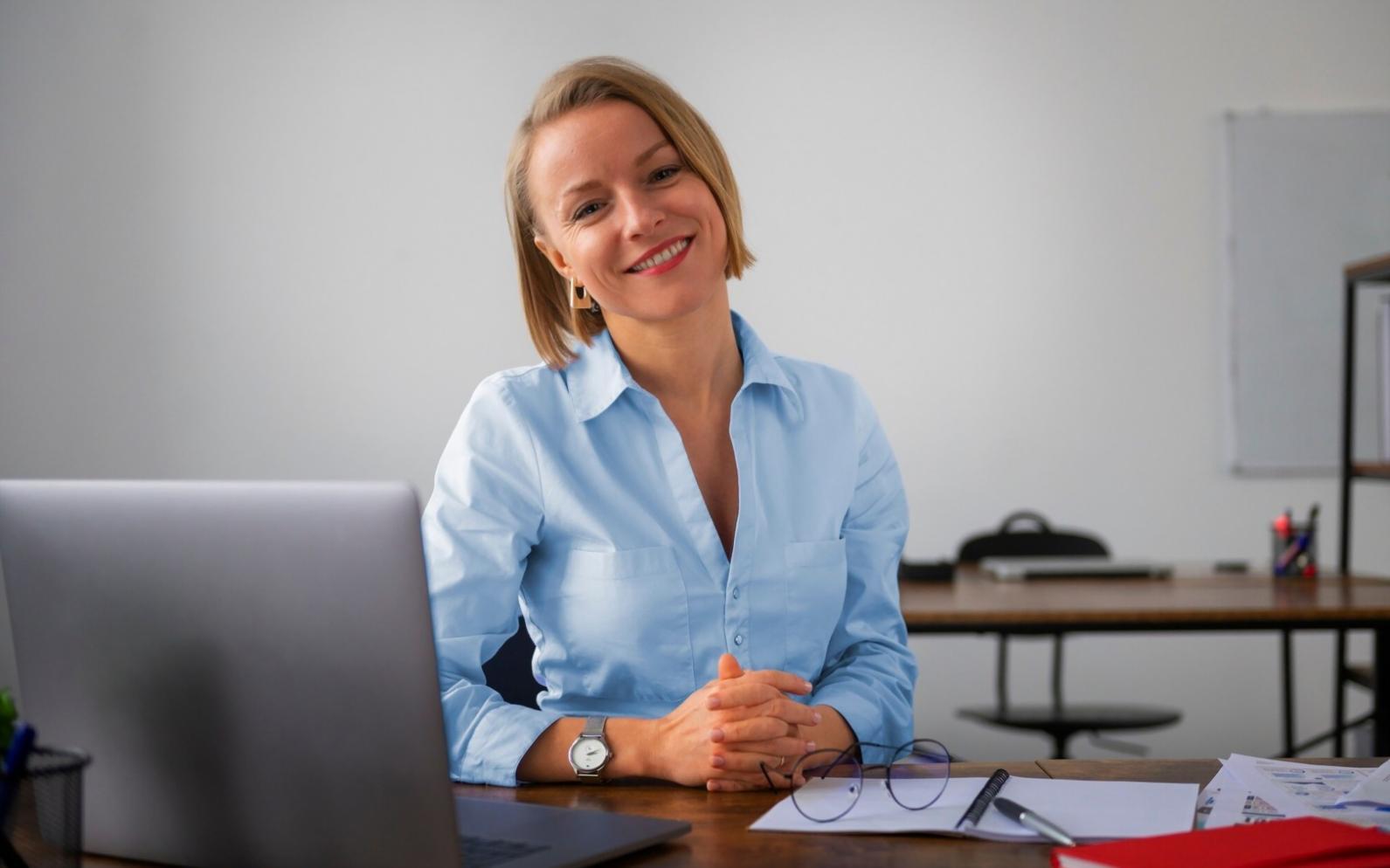 Developer working on test automation framework with multiple monitors showing code and test results